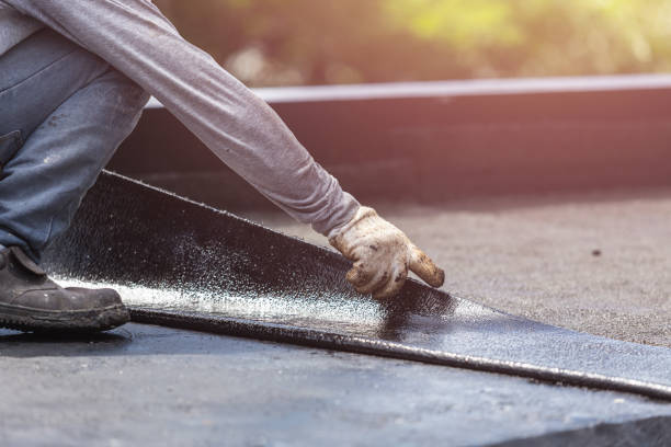 Professional Emergency Waterproofing technician working in Aurora, NY